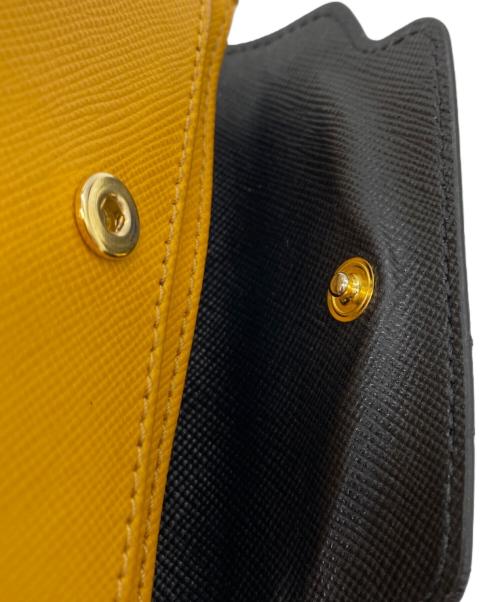 MARNI（マルニ）MARNI (マルニ) ケース ブラック×イエローの古着・服飾アイテム