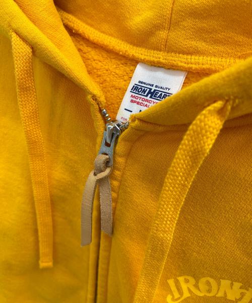 IRON HEART（アイアンハート）IRON HEART (アイアンハート) リフレクタープリントウルトラヘビーパーカー オレンジ サイズ:Mの古着・服飾アイテム