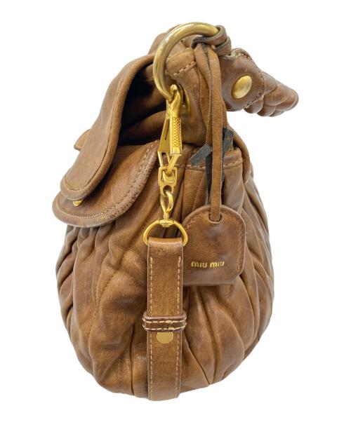 MIU MIU（ミュウミュウ）MIU MIU (ミュウミュウ) マテラッセ ブラウン×ゴールドの古着・服飾アイテム