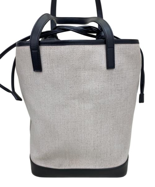 Saint Laurent Paris（サンローランパリ）Saint Laurent Paris (サンローランパリ) 巾着トートバッグ ホワイト×ブラックの古着・服飾アイテム