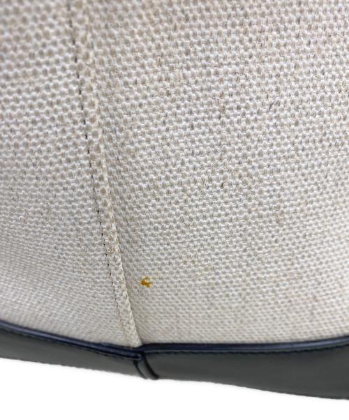 Saint Laurent Paris（サンローランパリ）Saint Laurent Paris (サンローランパリ) 巾着トートバッグ ホワイト×ブラックの古着・服飾アイテム