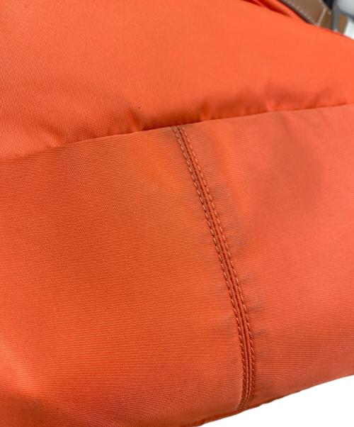 COACH（コーチ）COACH (コーチ) Keith Haring (キースヘリング) リュック オレンジの古着・服飾アイテム