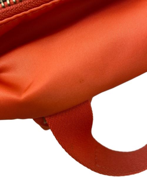 COACH（コーチ）COACH (コーチ) Keith Haring (キースヘリング) リュック オレンジの古着・服飾アイテム