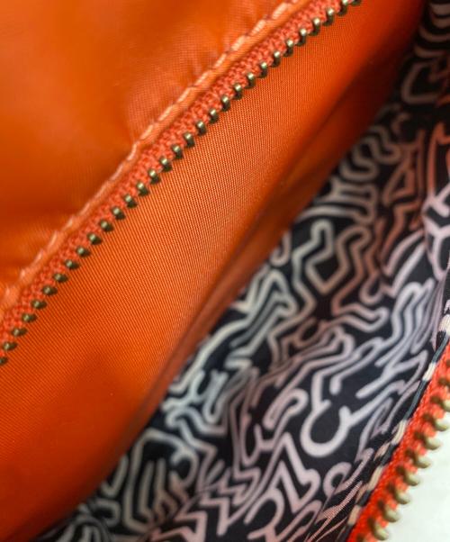 COACH（コーチ）COACH (コーチ) Keith Haring (キースヘリング) リュック オレンジの古着・服飾アイテム