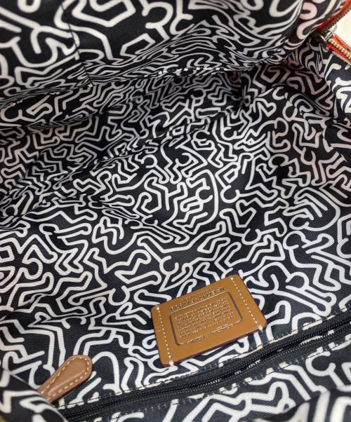 COACH（コーチ）COACH (コーチ) Keith Haring (キースヘリング) リュック オレンジの古着・服飾アイテム