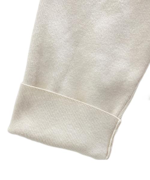 M-premierBLACK（エムプルミエブラック）M-premierBLACK (エムプルミエブラック) ラウンドヘムペプラムニット アイボリー サイズ:36の古着・服飾アイテム