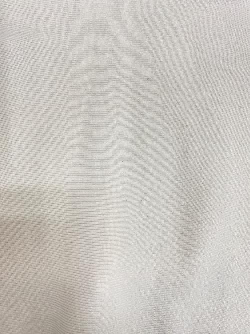 M-premierBLACK（エムプルミエブラック）M-premierBLACK (エムプルミエブラック) ラウンドヘムペプラムニット アイボリー サイズ:36の古着・服飾アイテム