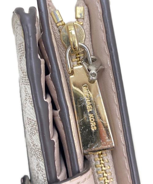 MICHAEL KORS（マイケル・コース）MICHAEL KORS (マイケル・コース) 2つ折り財布 ピンクの古着・服飾アイテム