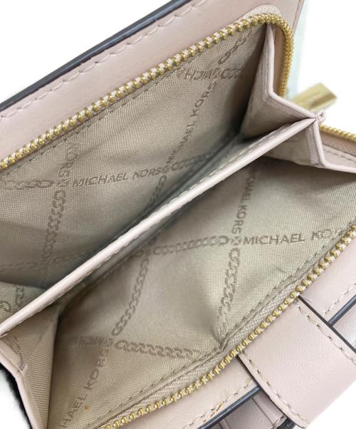 MICHAEL KORS（マイケル・コース）MICHAEL KORS (マイケル・コース) 2つ折り財布 ピンクの古着・服飾アイテム