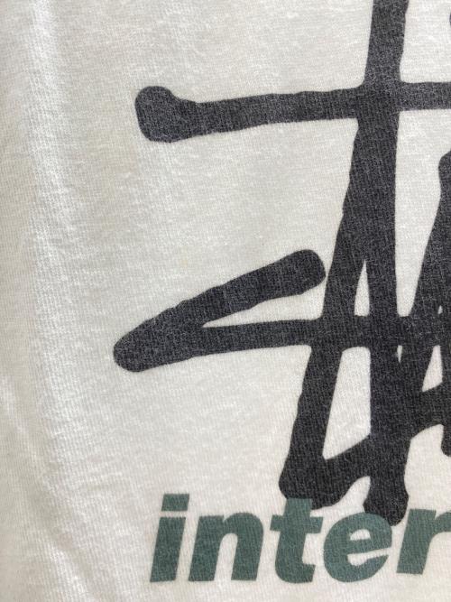 stussy（ステューシー）stussy (ステューシー) stussy international logo tee アイボリー サイズ:Mの古着・服飾アイテム