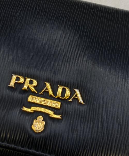 PRADA（プラダ）PRADA (プラダ) 3つ折り財布 ブラック×レッドの古着・服飾アイテム