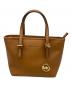 MICHAEL KORS（マイケルコース）の古着「JET SET TRAVEL XS CARRYALL TZ TOTE」｜ブラウン