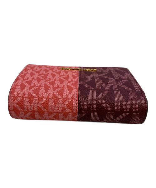 MICHAEL KORS（マイケルコース）MICHAEL KORS (マイケルコース) ジェット セット トラベルミディアム ウォレット ピンク×パープルの古着・服飾アイテム