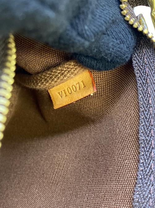 LOUIS VUITTON（ルイ ヴィトン）LOUIS VUITTON (ルイ ヴィトン) モノグラム・ポシェット・アクセソワール ブラウンの古着・服飾アイテム