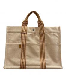 HERMES（エルメス）の古着「ニューフールトゥ・MMトートバッグ」｜オレンジ