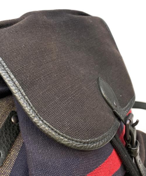 BURBERRY（バーバリー）BURBERRY (バーバリー) リュック レッド×ネイビーの古着・服飾アイテム