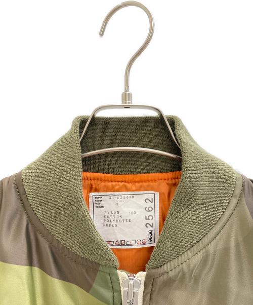 sacai（サカイ）sacai (サカイ) KAWS (カウズ) MA-1 ブルゾン / ボンバージャケット グリーン サイズ:3 未使用品の古着・服飾アイテム
