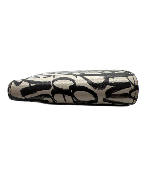 DOLCE & GABBANA（ドルチェ＆ガッバーナ）DOLCE & GABBANA (ドルチェ＆ガッバーナ) 2つ折り財布 ホワイト×ブラックの古着・服飾アイテム