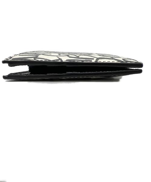 DOLCE & GABBANA（ドルチェ＆ガッバーナ）DOLCE & GABBANA (ドルチェ＆ガッバーナ) 2つ折り財布 ホワイト×ブラックの古着・服飾アイテム