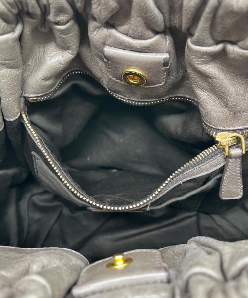 MIU MIU（ミュウミュウ）MIU MIU (ミュウミュウ) ヴィッテロリュクス グレーの古着・服飾アイテム