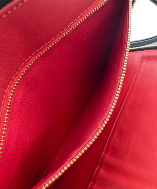 Christian Louboutin（クリスチャン・ルブタン）Christian Louboutin (クリスチャン・ルブタン) クラッチバッグ ベージュ×ブラックの古着・服飾アイテム