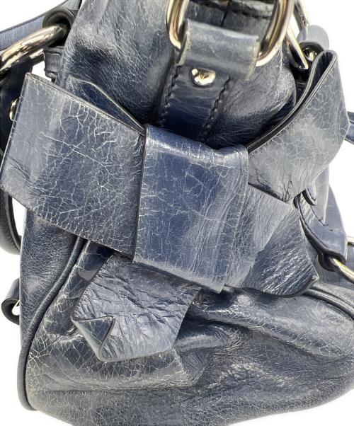 MIU MIU（ミュウミュウ）MIU MIU (ミュウミュウ) サイドリボン2WAYバッグ ネイビーの古着・服飾アイテム