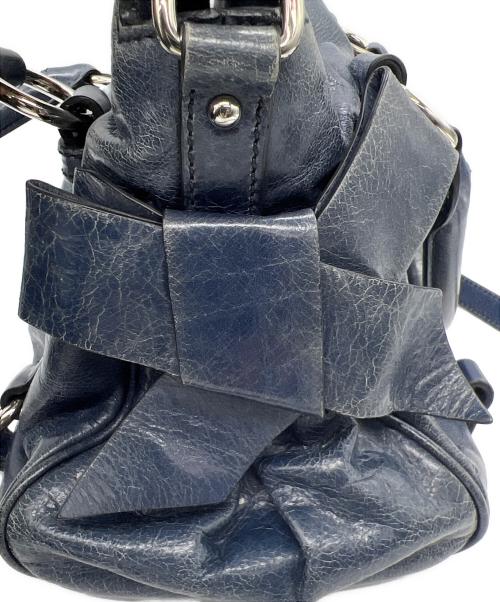 MIU MIU（ミュウミュウ）MIU MIU (ミュウミュウ) サイドリボン2WAYバッグ ネイビーの古着・服飾アイテム