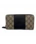 GUCCI（グッチ）の古着「ラウンドファスナー財布」｜ブラック×ベージュ