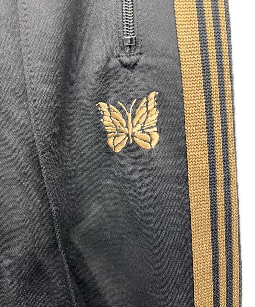 Needles（ニードルズ）Needles (ニードルズ) ナロートラックパンツ ブラック×ゴールド サイズ:Mの古着・服飾アイテム