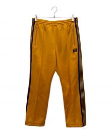 Needles（ニードルズ）の古着「ナロートラックパンツ」｜オレンジ×パープル