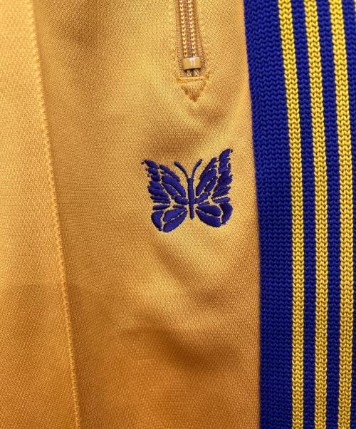 Needles（ニードルズ）Needles (ニードルズ) ナロートラックパンツ オレンジ×パープル サイズ:Mの古着・服飾アイテム