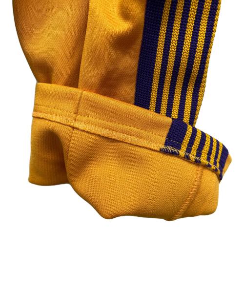 Needles（ニードルズ）Needles (ニードルズ) ナロートラックパンツ オレンジ×パープル サイズ:Mの古着・服飾アイテム