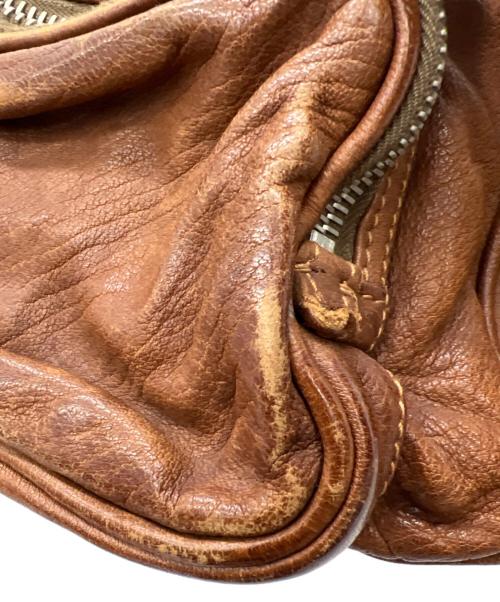 PRADA（プラダ）PRADA (プラダ) ウォッシュドレザーボストンバッグ ブラウンの古着・服飾アイテム