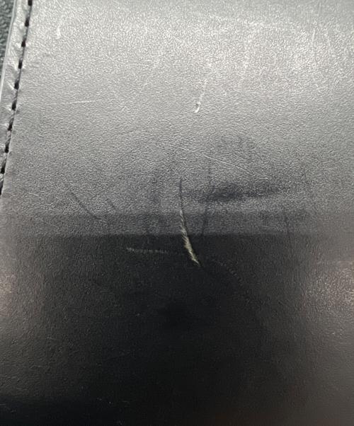 Yohji Yamamoto pour homme（ヨウジヤマモト プールオム）Yohji Yamamoto pour homme (ヨウジヤマモト プールオム) 2つ折り財布 COW LEATHER FASTENER WALLET S ブラックの古着・服飾アイテム