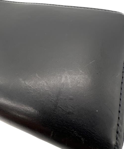 Yohji Yamamoto pour homme（ヨウジヤマモト プールオム）Yohji Yamamoto pour homme (ヨウジヤマモト プールオム) 2つ折り財布 COW LEATHER FASTENER WALLET S ブラックの古着・服飾アイテム