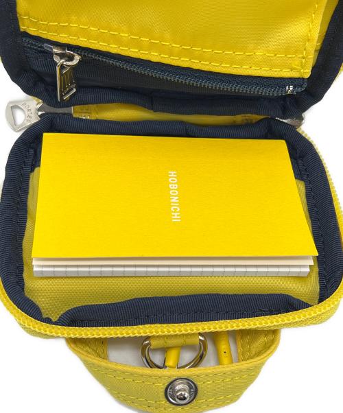 HOBONICHI TECHO（ホボニチテチョウ）HOBONICHI TECHO (ホボニチテチョウ) MINI WALLET Stroll Jr. イエローの古着・服飾アイテム