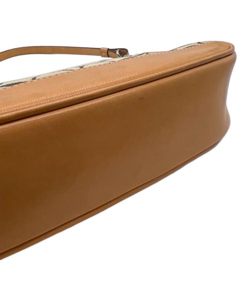 COACH（コーチ）COACH (コーチ) アクセサリーポーチ ベージュの古着・服飾アイテム