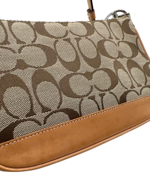 COACH（コーチ）COACH (コーチ) アクセサリーポーチ ベージュの古着・服飾アイテム