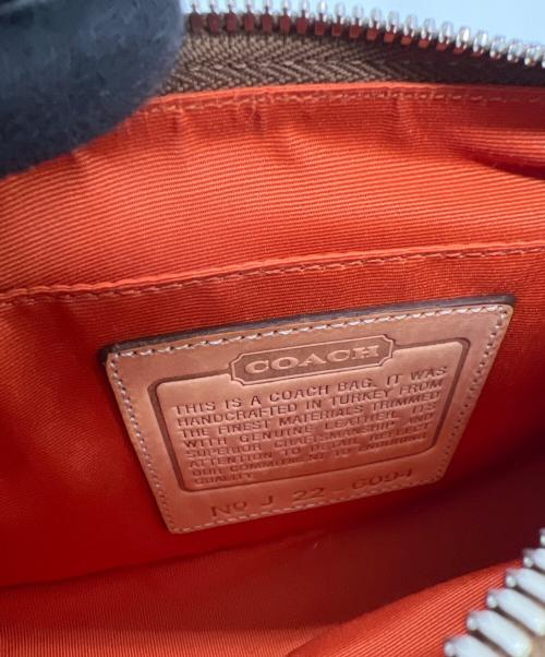 COACH（コーチ）COACH (コーチ) アクセサリーポーチ ベージュの古着・服飾アイテム