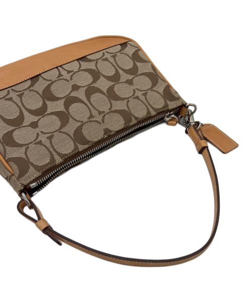 COACH（コーチ）COACH (コーチ) アクセサリーポーチ ベージュの古着・服飾アイテム