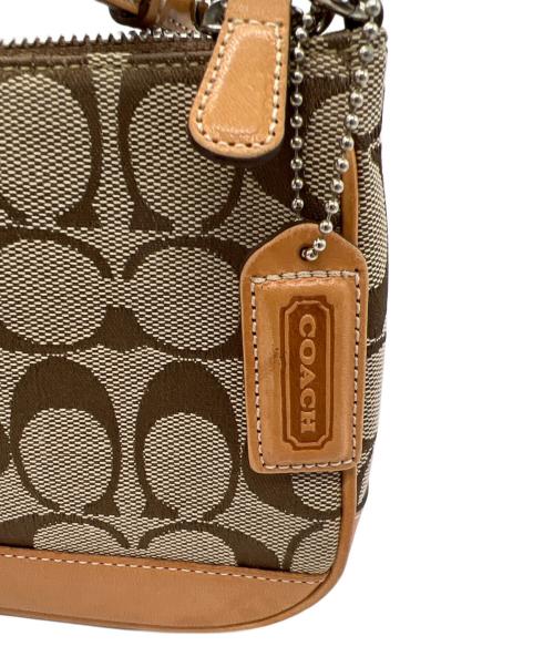 COACH（コーチ）COACH (コーチ) アクセサリーポーチ ベージュの古着・服飾アイテム