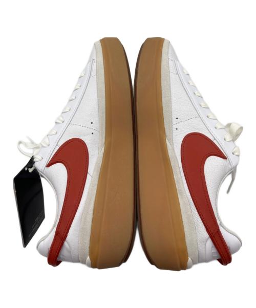 NIKE（ナイキ）NIKE (ナイキ) ローカットスニーカー ホワイト×オレンジ サイズ:27の古着・服飾アイテム