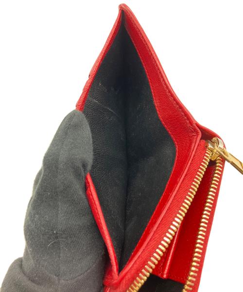 Yves Saint Laurent（イヴサンローラン）Yves Saint Laurent (イヴサンローラン) 2つ折り財布 レッドの古着・服飾アイテム