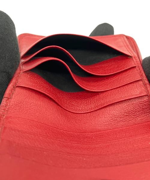 Yves Saint Laurent（イヴサンローラン）Yves Saint Laurent (イヴサンローラン) 2つ折り財布 レッドの古着・服飾アイテム