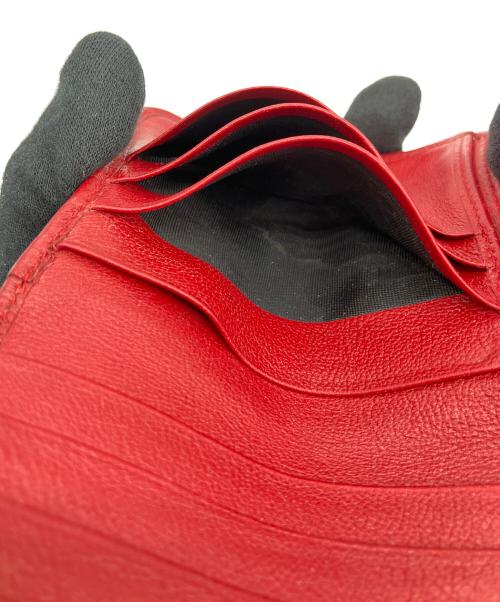 Yves Saint Laurent（イヴサンローラン）Yves Saint Laurent (イヴサンローラン) 2つ折り財布 レッドの古着・服飾アイテム