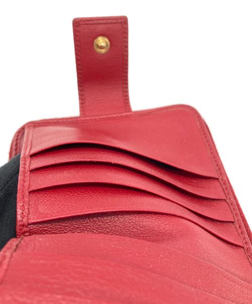 Yves Saint Laurent（イヴサンローラン）Yves Saint Laurent (イヴサンローラン) 2つ折り財布 レッドの古着・服飾アイテム