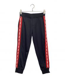 DSQUARED2（ディースクエアード）の古着「トラックパンツ」｜ブラック×レッド
