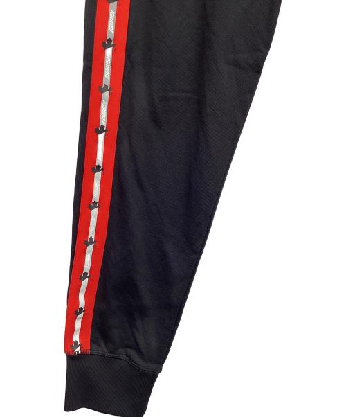 DSQUARED2（ディースクエアード）DSQUARED2 (ディースクエアード) トラックパンツ ブラック×レッド サイズ:XSの古着・服飾アイテム
