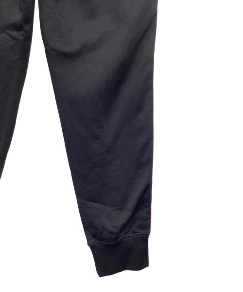 DSQUARED2（ディースクエアード）DSQUARED2 (ディースクエアード) トラックパンツ ブラック×レッド サイズ:XSの古着・服飾アイテム