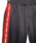 中古・古着 DSQUARED2 (ディースクエアード) トラックパンツ ブラック×レッド サイズ:XS：13000円